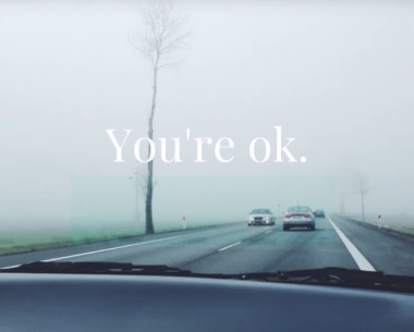 Image of a street with near fog, and the text "You're okay".