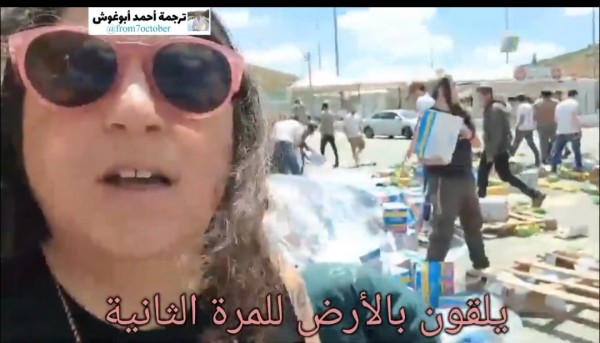 screen capture of video shared by Israeli terrorist settler documenting their destruction of humanitarian aid.