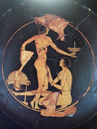Red-figure vase painting of two women, one standing, the other crouching, two fingers on the other woman's vulva.