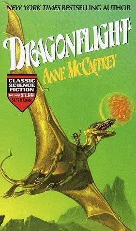 Green gold tones. This is the Michael Whelan cover. Features a huge golden dragon soaring across the cover, with the tiny figure of a woman in white, with dark hair. The dragon is flying by mountain terrain, and her head is just overlapping a large red planet. Her jaws are open, as if she's roaring. Title is in white, in a fancy all caps font. Author's name is in yellow just below it. 

