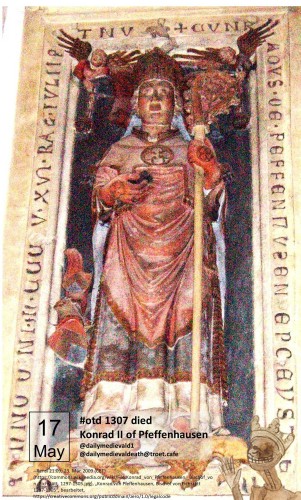 The picture shows a painted funerary monument with the figure of a bishop in his regalia.