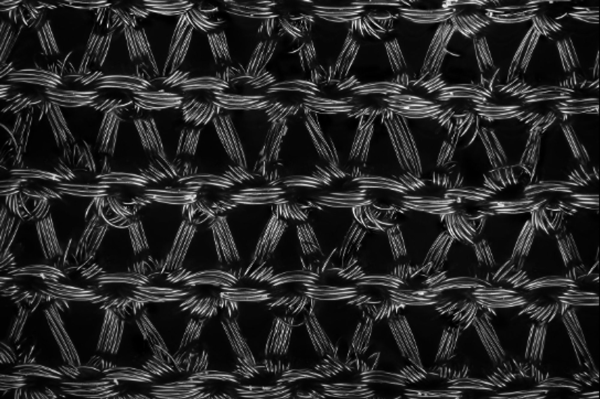 Nylon stockings under a microscope, 2021. Nylon, a polymer created in 1939, had widespread use, particularly and gradually replaced natural materials like silk, catgut, fur, and leather (Quye 2014: 214). For more information, please visit https://www.mpiwg-berlin.mpg.de/news/fabricated-natures-stories-bio-material-archive-deadline-july-15-2024